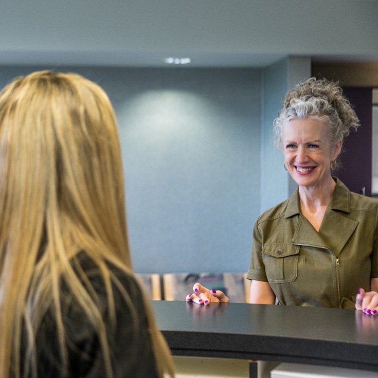 Patient in Centennial smiling after affordable teeth whitening treatment