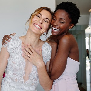 A patient and her bridesmaid getting ready for wedding ceremony