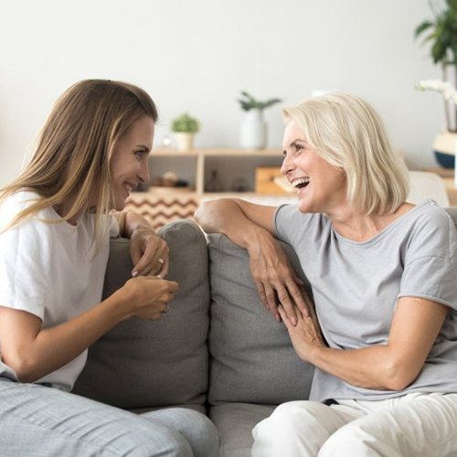 Ladies converse on couch