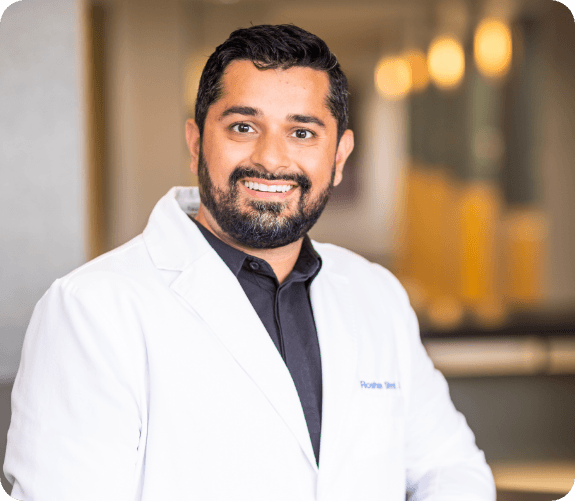 smiling Dr. Roshan Shroff