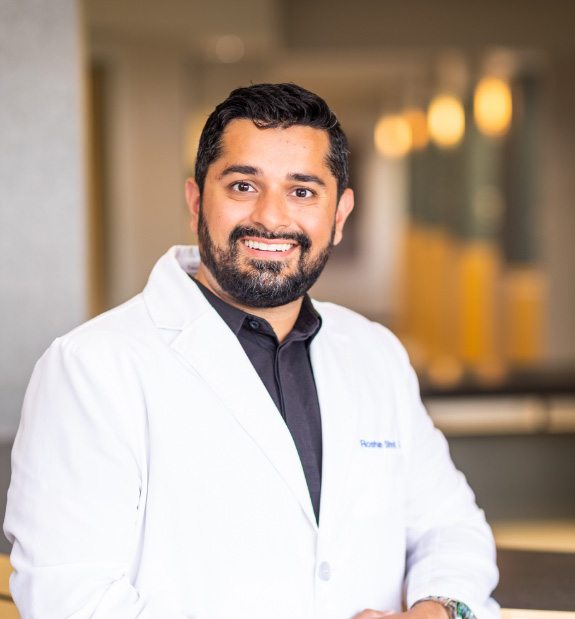 photo of Dr. Roshan Shroff smiling