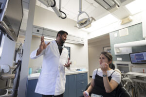 Dr. Shroff speaking with patient. 
